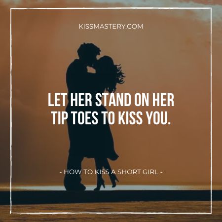 a girl standing on her tiptoes to kiss a boy.