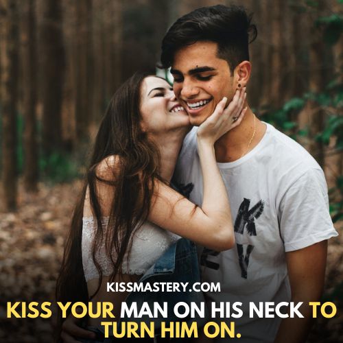 girl kissing guy's neck