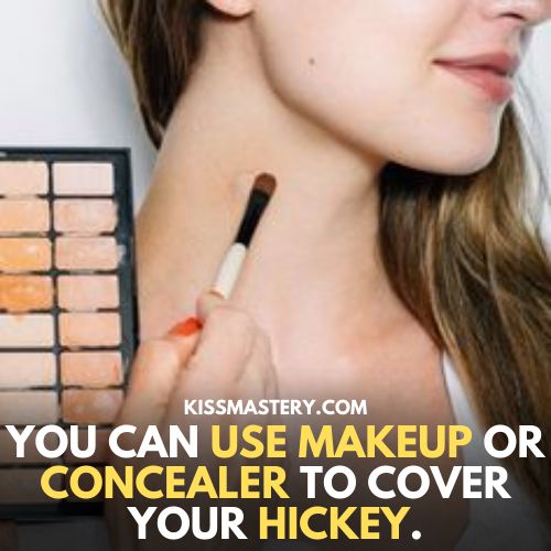 You can use makeup or concealer to cover your hickey