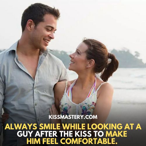couple looking into each other eyes: how to kiss a guy.
