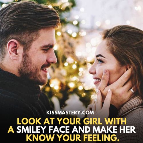 boy and girl looking at each other: how to kiss a girl.